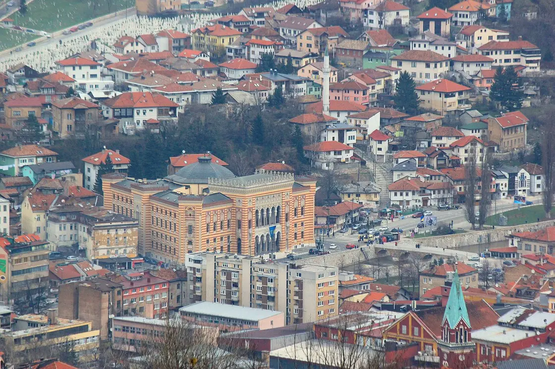 View over the red roofs and minarets of the Baščaršija old town of Sarajevo from the hills