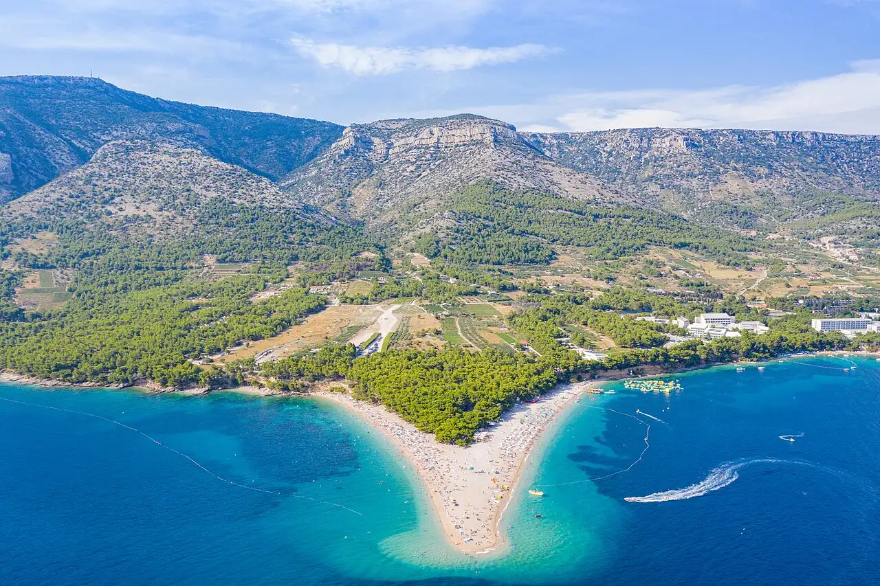 The Zlatni Rat pebble spit reaching into turquoise sea below Vidova Gora on Brac island
