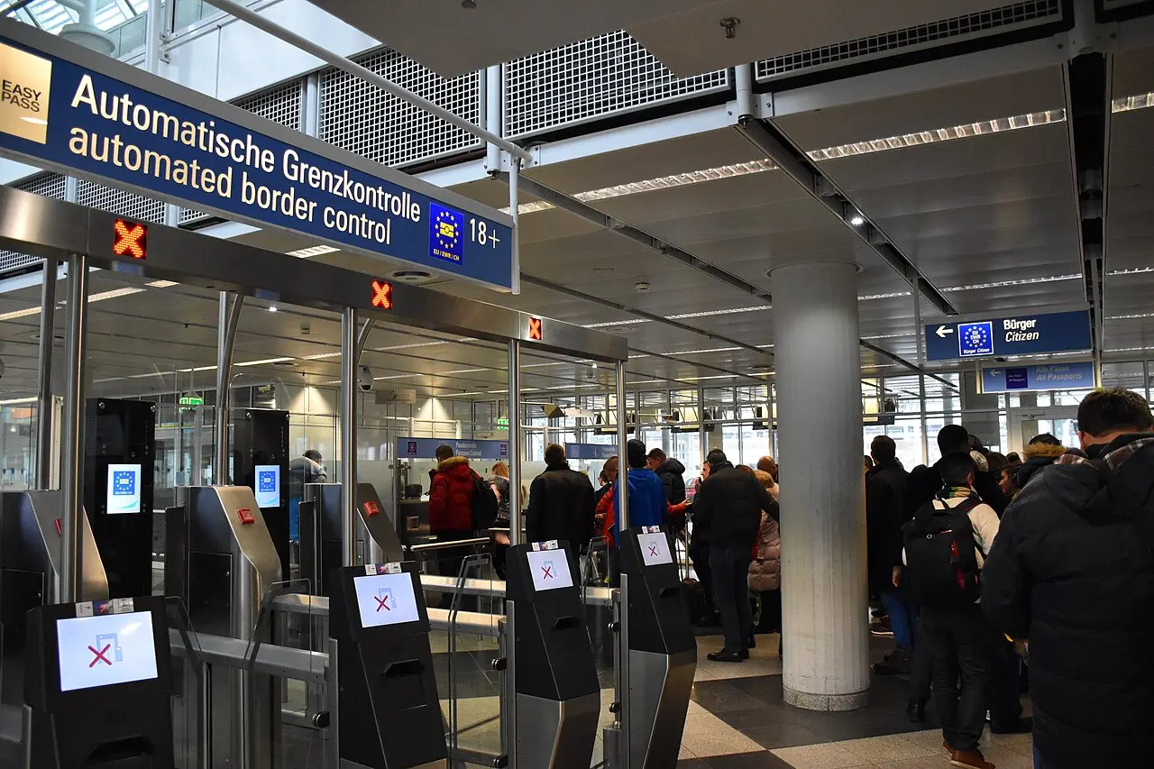 Passport control booths at an airport arrival hall