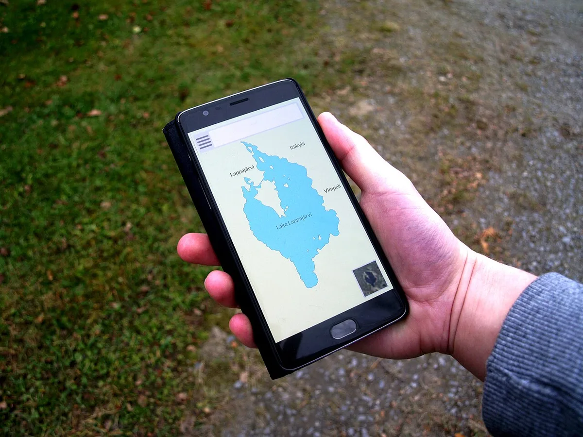 A smartphone showing a navigation map app, the everyday use for travel data