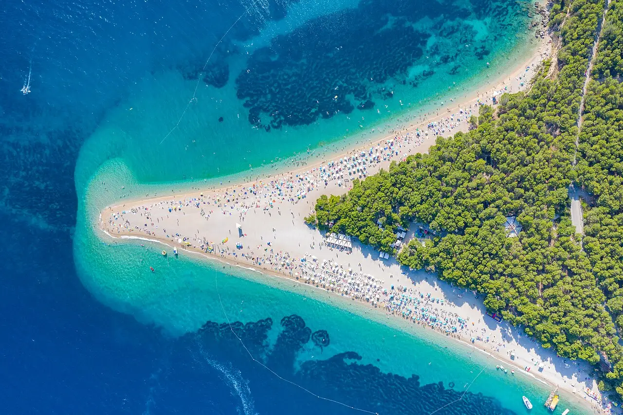 Aerial view of the Zlatni Rat (Golden Horn) beach spit at Bol on Brač island