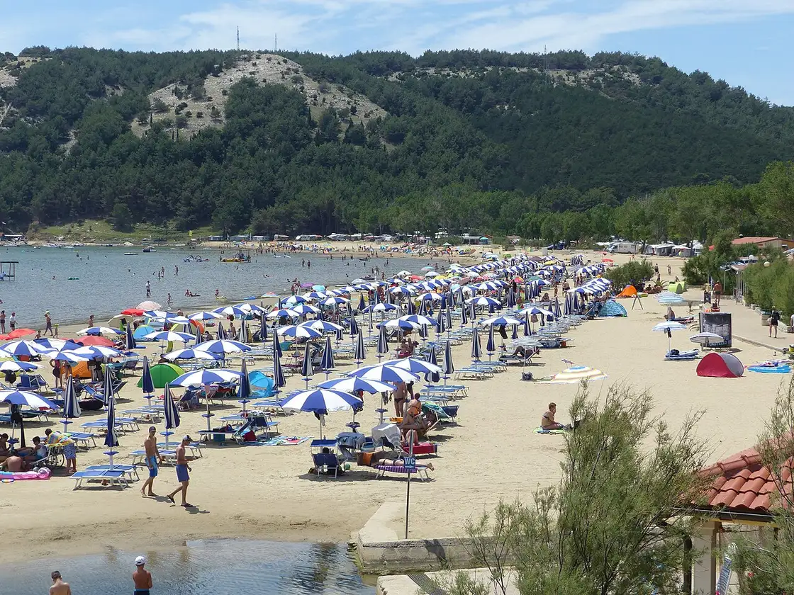 The shallow sandy Paradise Beach at Lopar on Rab island