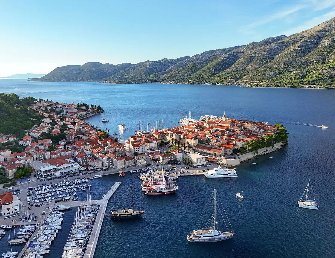 The walled old town of Korcula on its little peninsula, ringed by terracotta roofs and sea