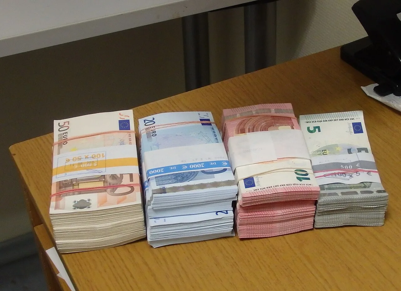 Stacks of euro banknotes in 50, 20, 10 and 5 denominations
