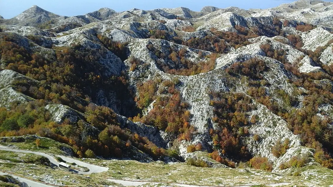 A road winding through the karst mountains of Biokovo above the Dalmatian coast in autumn colours