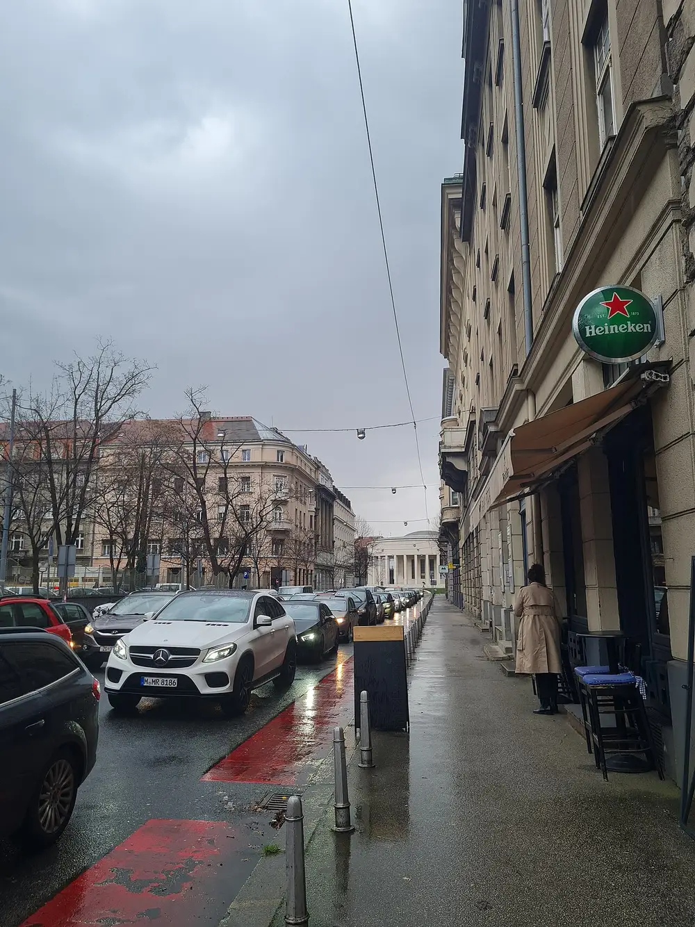 A narrow street in central Zagreb with historic buildings