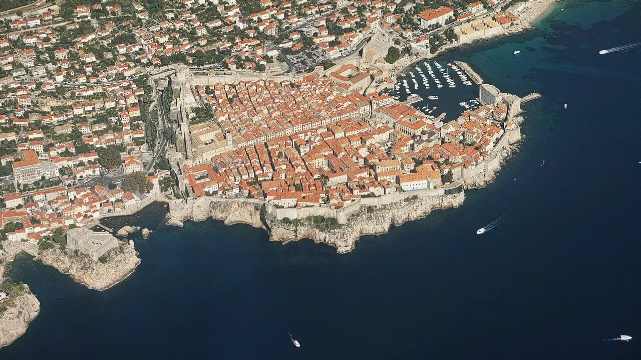 Aerial view of the walled Old Town of Dubrovnik jutting into the Adriatic Sea