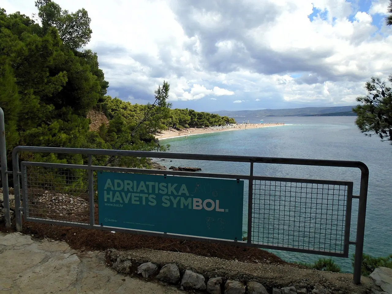 The Zlatni Rat beach spit at Bol on Brac island jutting into the turquoise Adriatic