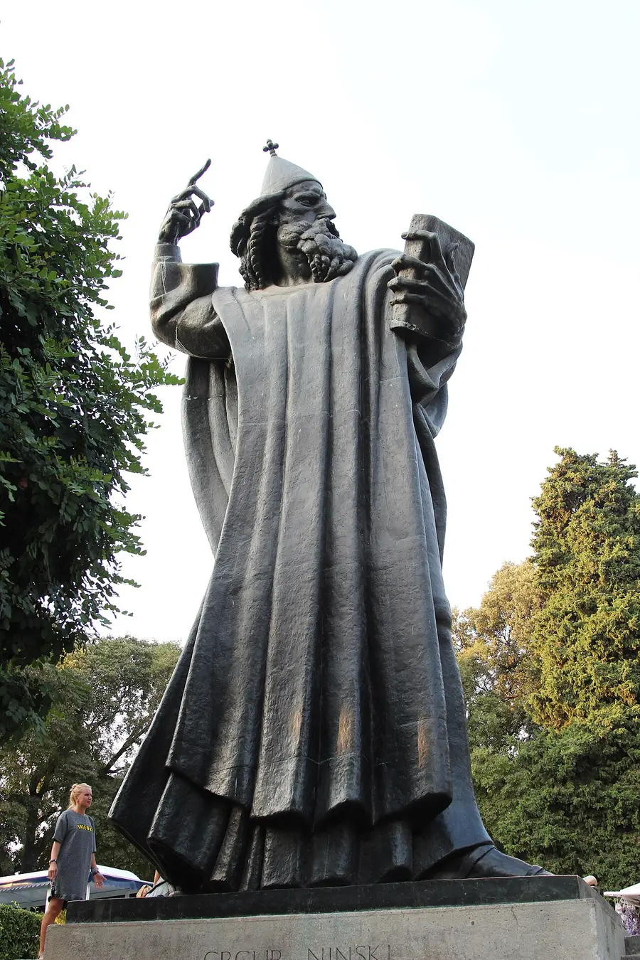 The large green bronze statue of Gregory of Nin by Ivan Meštrović standing outside the Golden Gate of Diocletian's Palace in Split