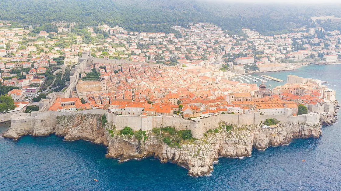 The city walls of Dubrovnik Old Town above the steep Adriatic coast