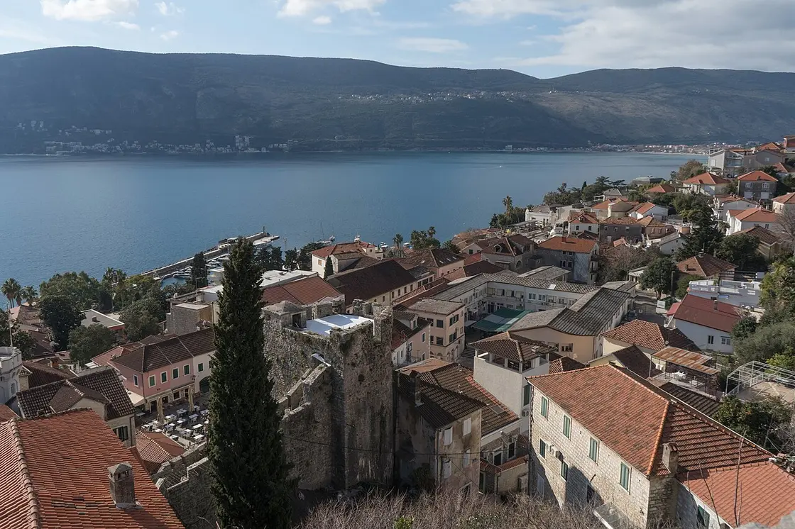 View over the red rooftops of Herceg Novi Old Town and the bay from the Kanli Kula fortress