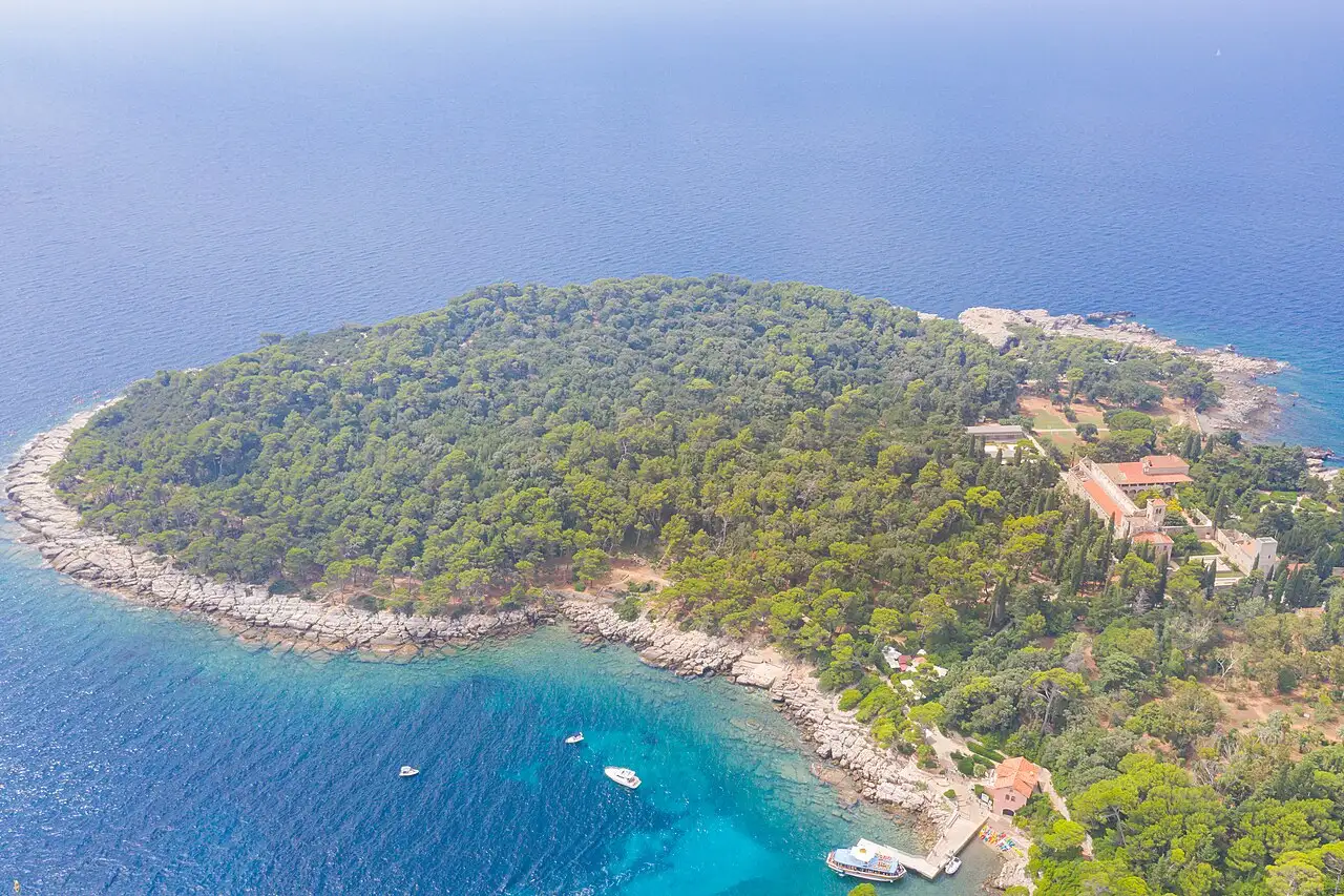 Aerial view of the wooded island of Lokrum with its harbour and monastery