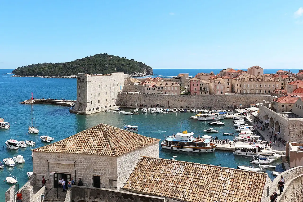The Old Port of Dubrovnik with the Fort of St. John and Lokrum island behind