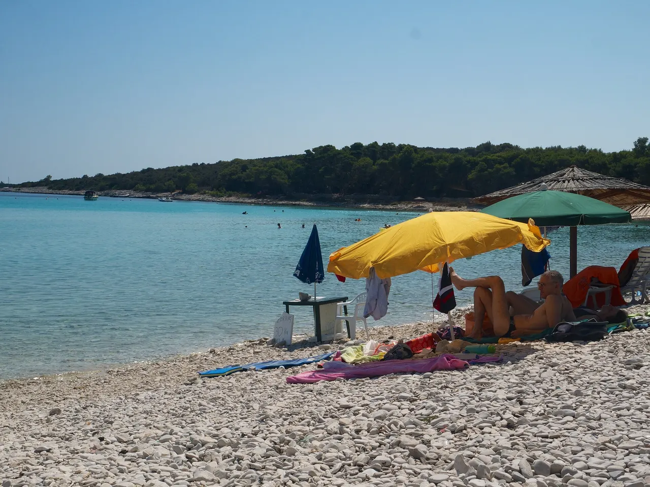 Close view of Sakarun shore with pale sand meeting turquoise shallows