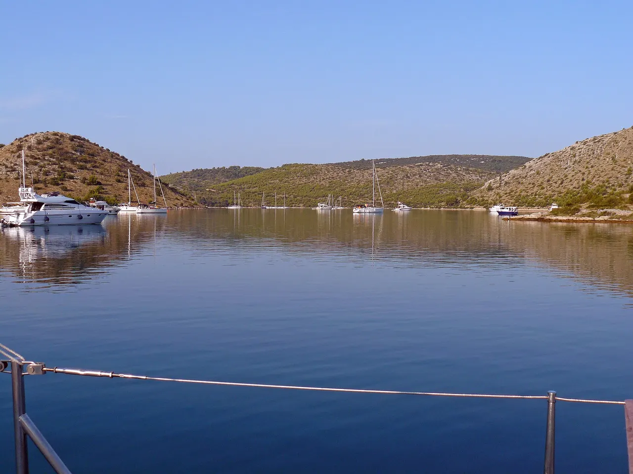 Wide view across Telašćica Nature Park with rocky shores and blue water