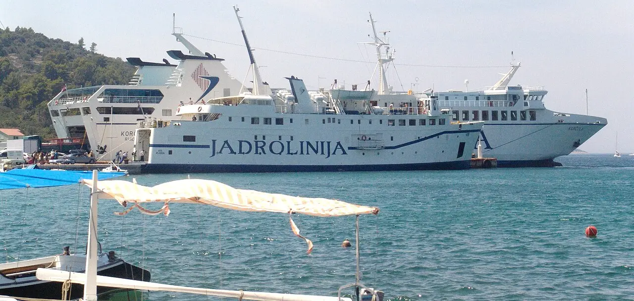 Ferries including a Jadrolinija vessel moored in Vela Luka bay on the western end of Korčula island