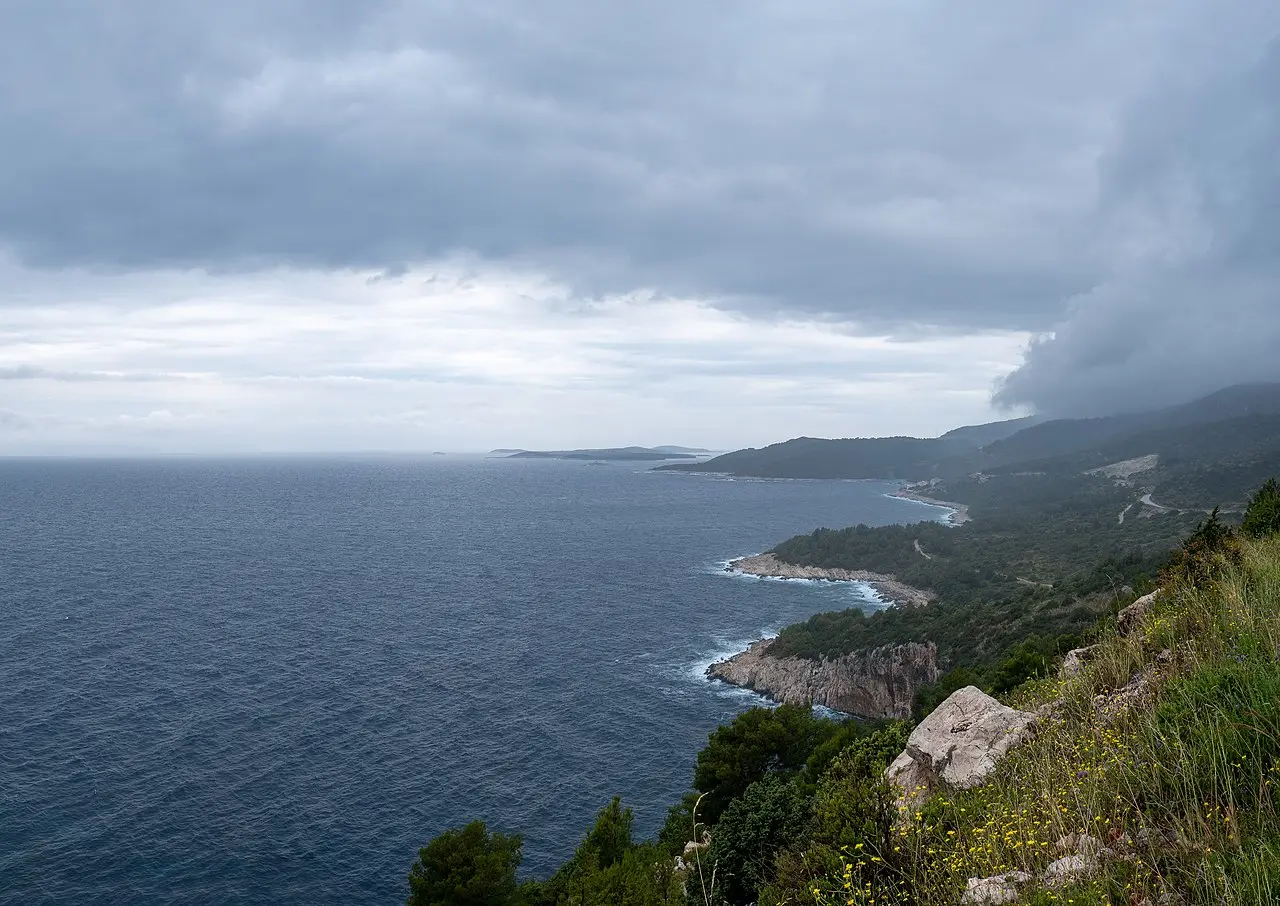 Hvar southern coastline with the low Pakleni islets across turquoise water