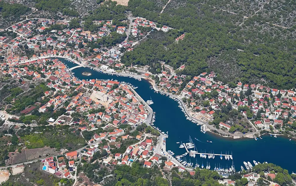 Aerial view of the narrow inlet and harbour of Vrboska on Hvar island