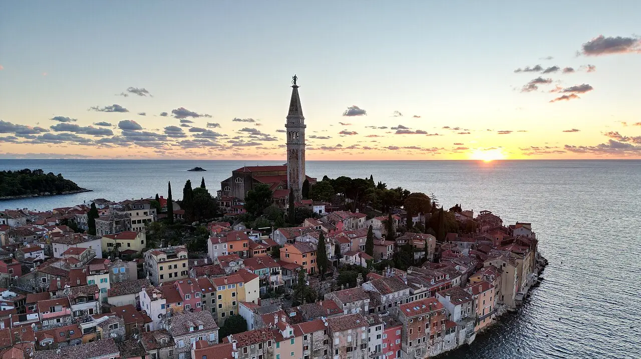 Aerial view of Rovinj on the Istrian coast, its old town packed onto a peninsula with the tall St Euphemia church tower rising above