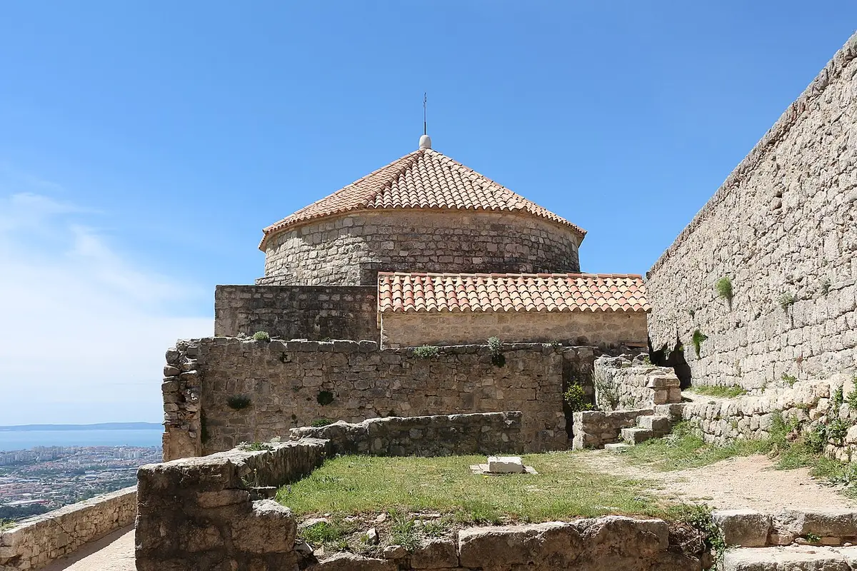 Small stone St Vid church inside the walls of Klis Fortress