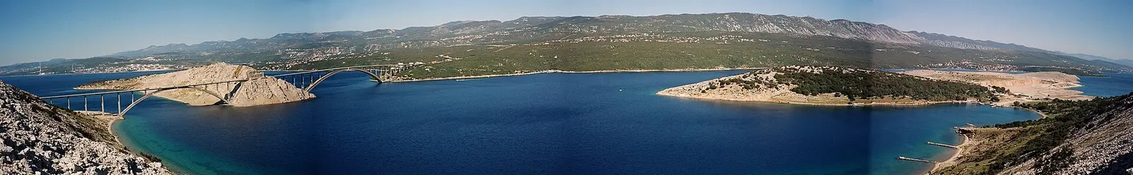 Panorama of the Krk Bridge crossing the channel between the mainland and the island