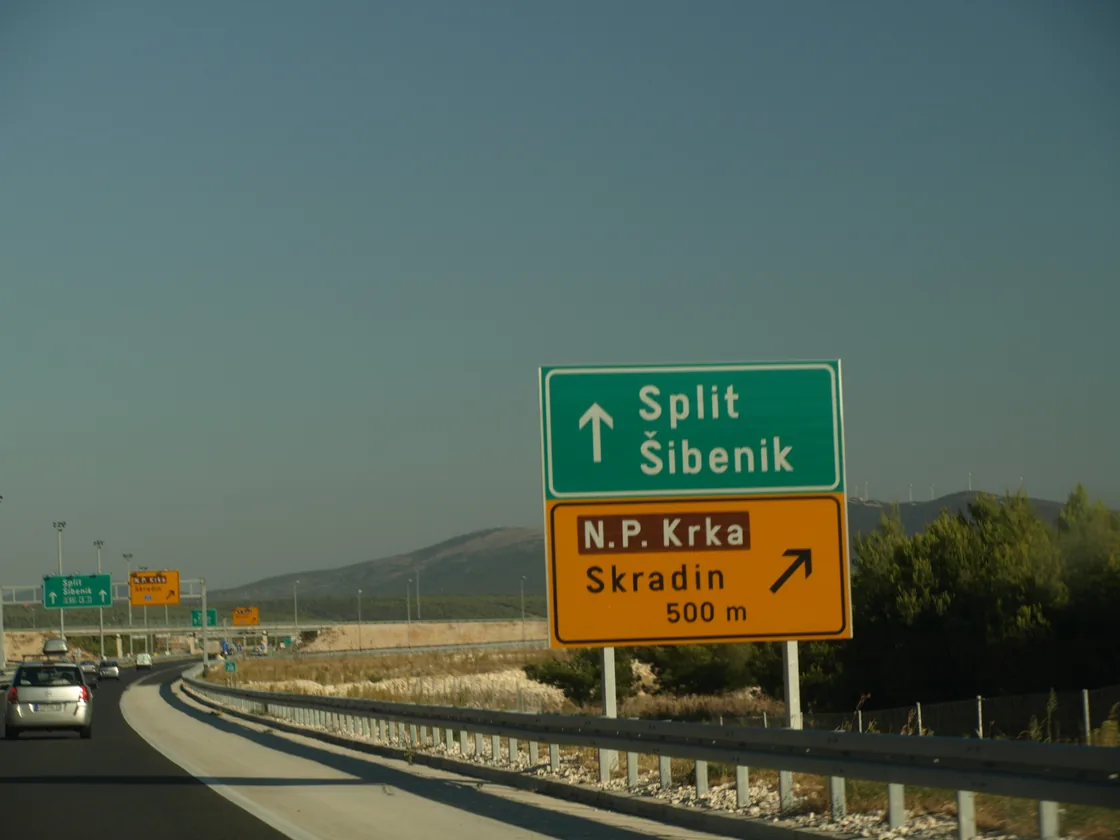 Motorway sign on the A1 in Croatia pointing to Split, Šibenik and the Krka National Park exit for Skradin