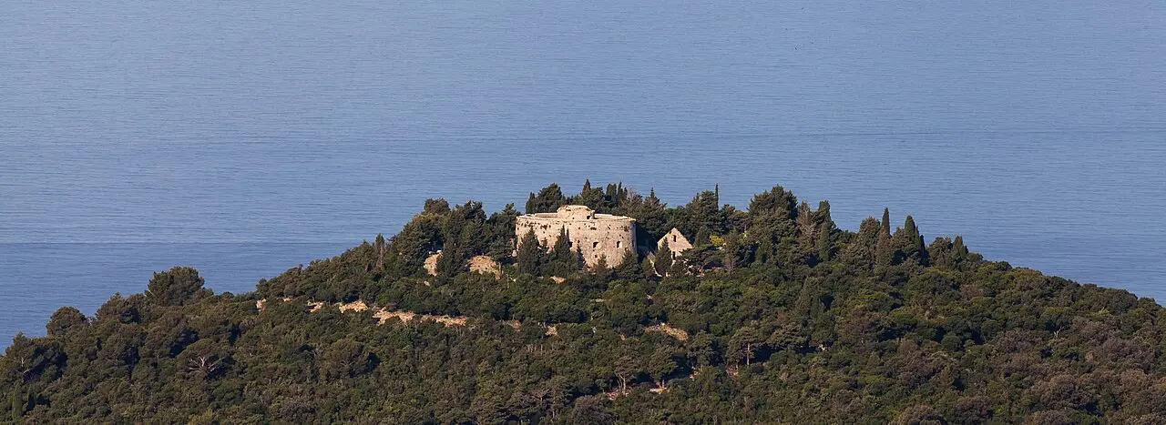 Fort Royal standing among pines on the wooded ridge at the highest point of Lokrum