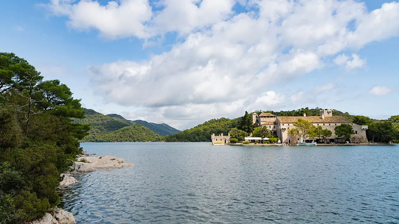 Aerial view over Veliko Jezero on Mljet with the wooded islet of St Mary and its monastery in the middle