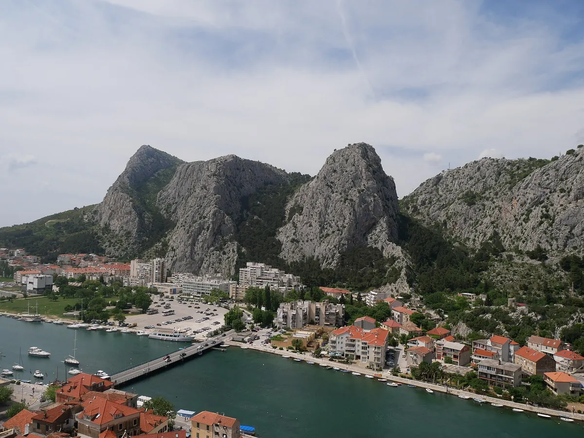 Bridge over the Cetina at Omiš with the town and hills beyond