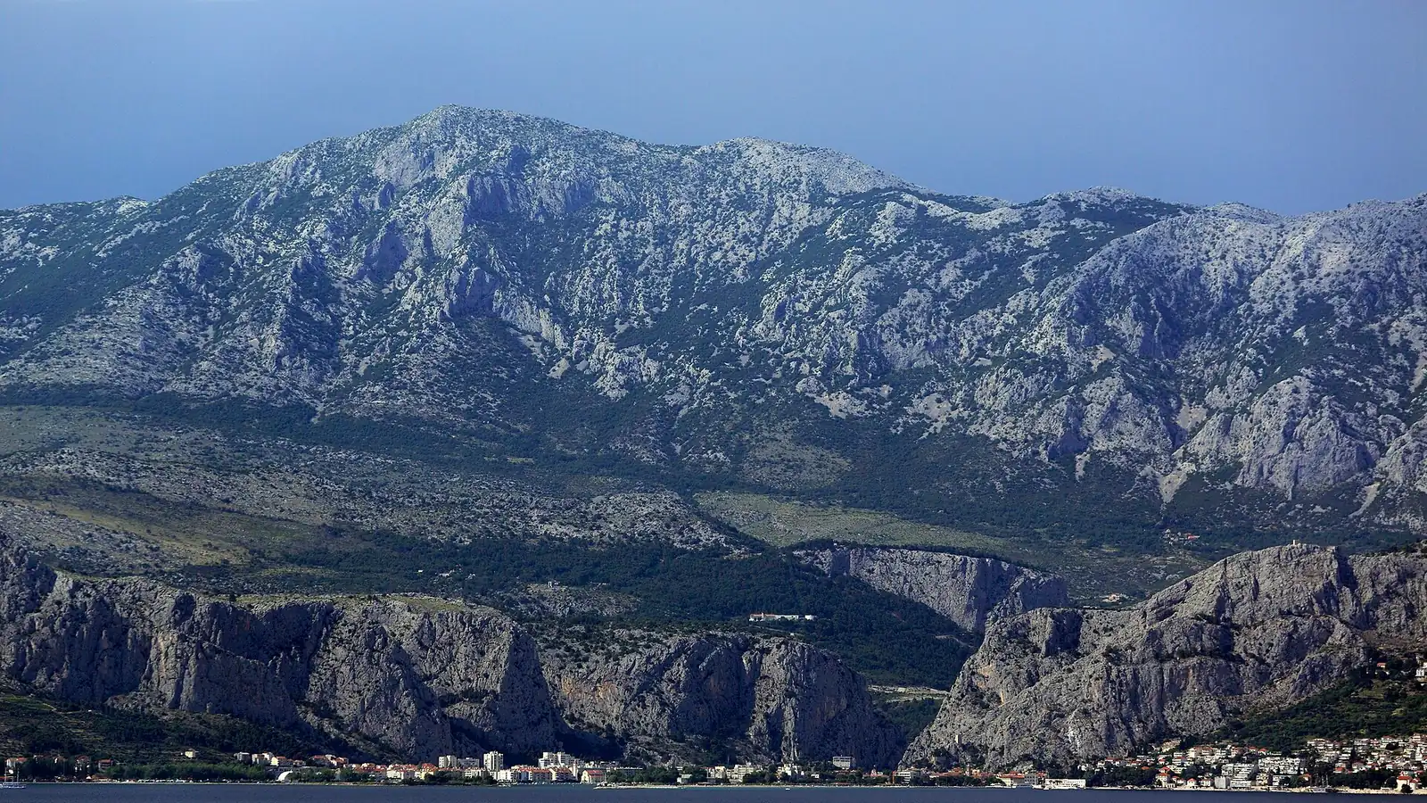 Omiš at the Cetina river mouth with the Adriatic and the Brač Channel beyond