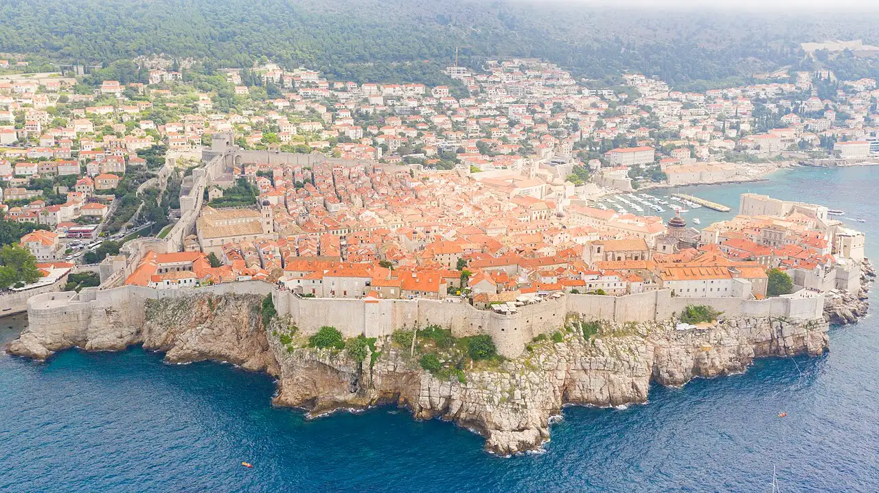 Aerial view of Dubrovnik's walled old town on its cliffs above the Adriatic