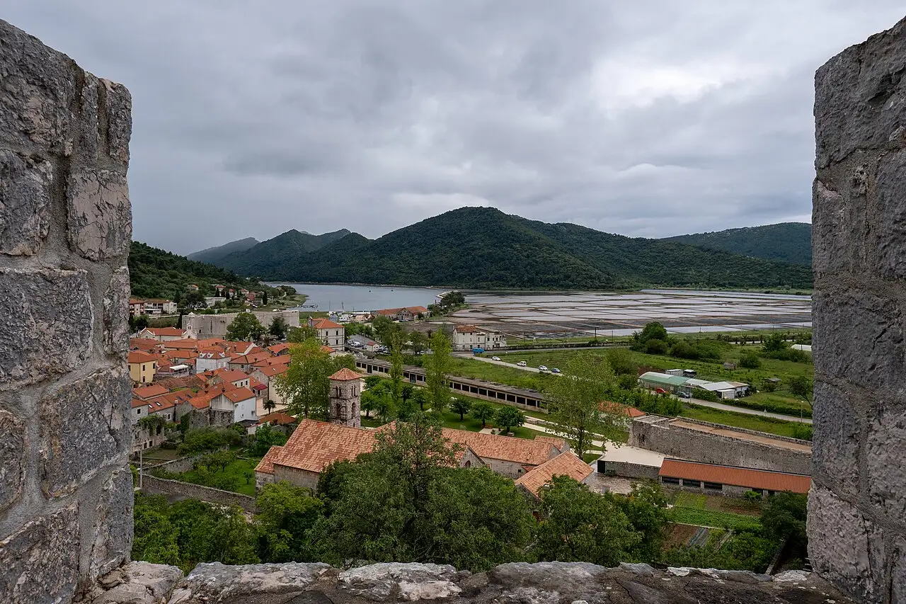 View through the Ston city walls over the town and salt pans on the Pelješac peninsula