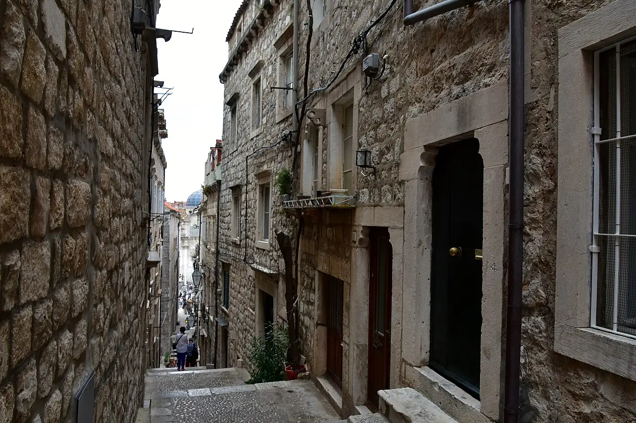 A narrow stepped stone lane in the old town of Dubrovnik, closed to cars
