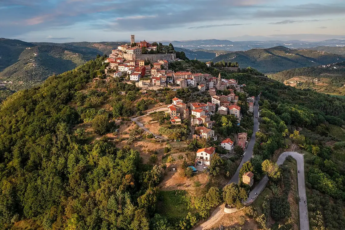 The hilltown of Motovun rising above the vineyards and forests of inland Istria
