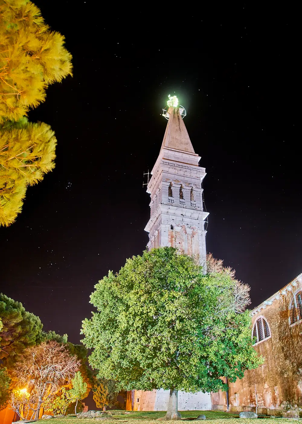 The tall Venetian-style bell tower of the church of St Euphemia rising above Rovinj