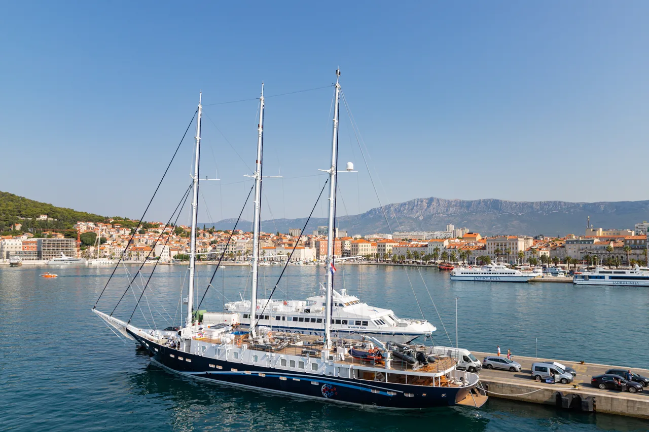 Catamarans and ferries berthed at the Split ferry port beside the city