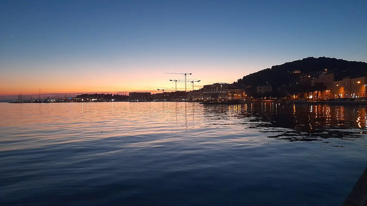 Split harbour and old town lights at night, the city Ultra visitors come back to after the stadium