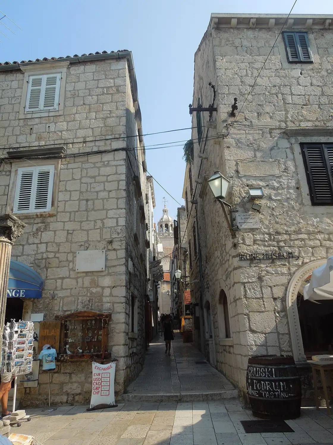 A steep stepped street of stone houses in Korčula old town