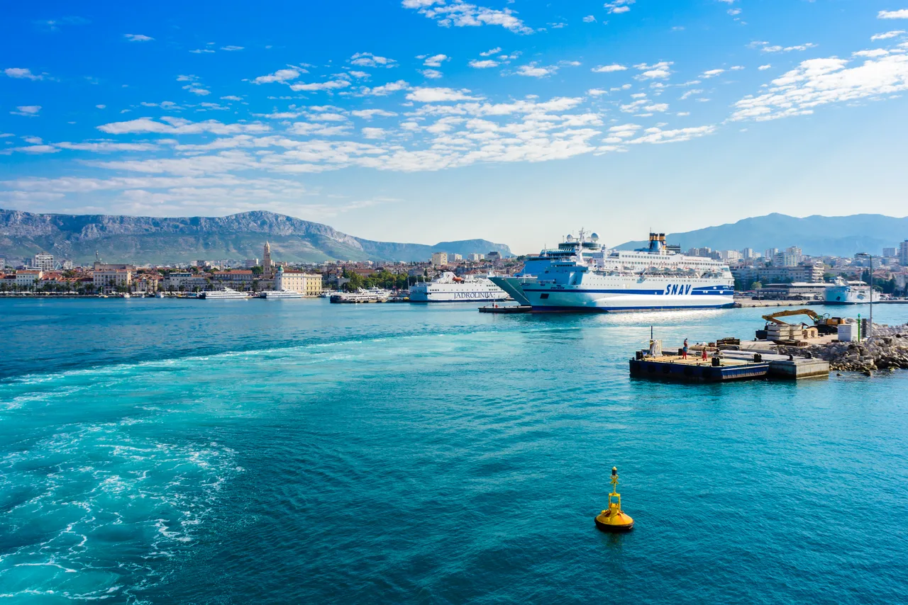 The ferry port of Split with Jadrolinija ferries berthed beside the old town