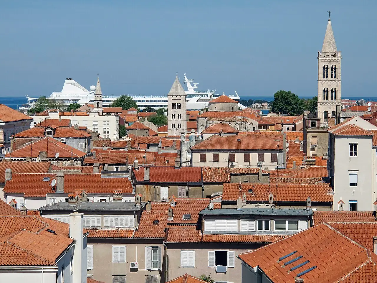 Stone lanes and terracotta roofs packing Zadar old town beside the sea