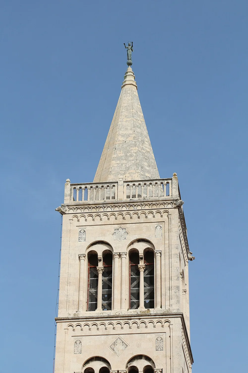 The tall Romanesque bell tower of the Cathedral of St Anastasia rising above Zadar old town