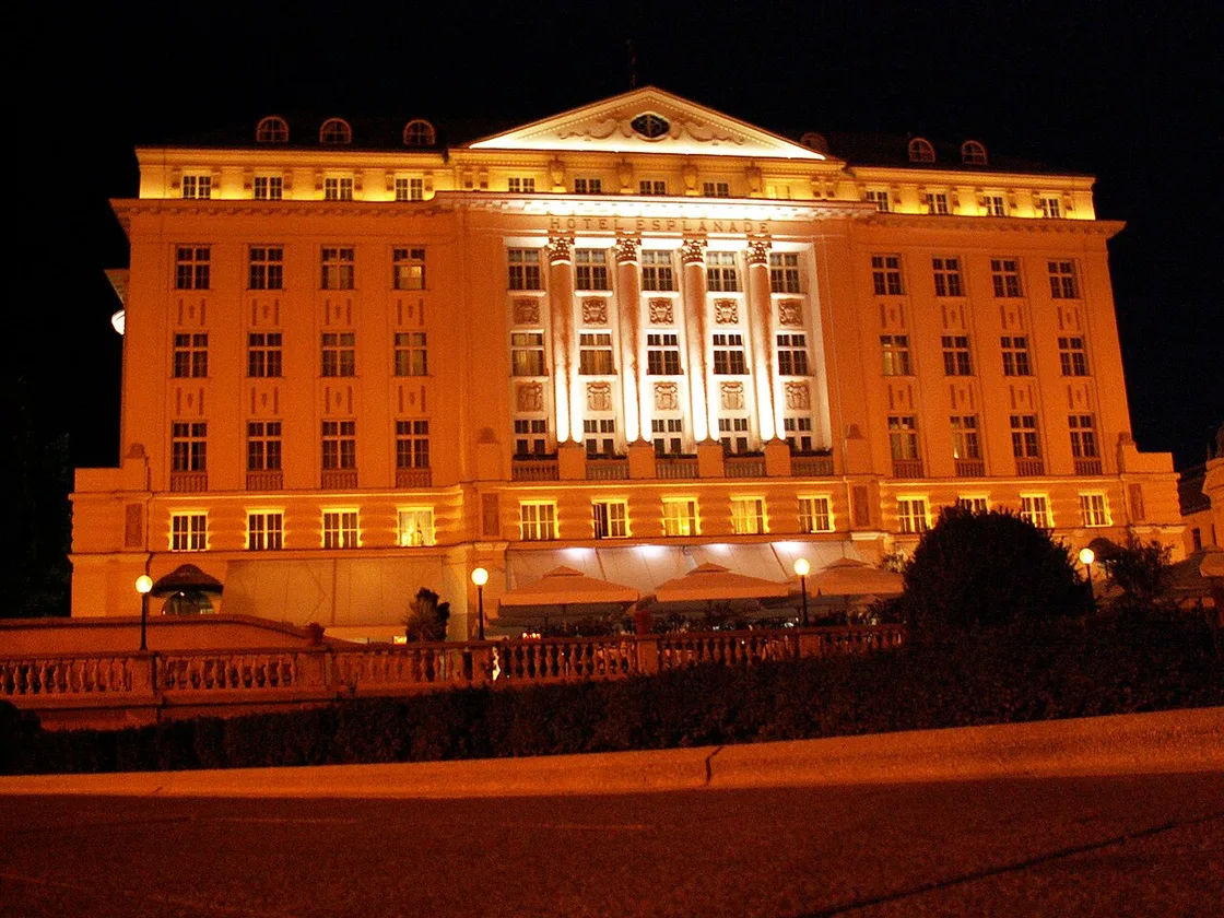 The Esplanade Zagreb hotel lit up at night, home to the 1925 Lounge and Cocktail Bar