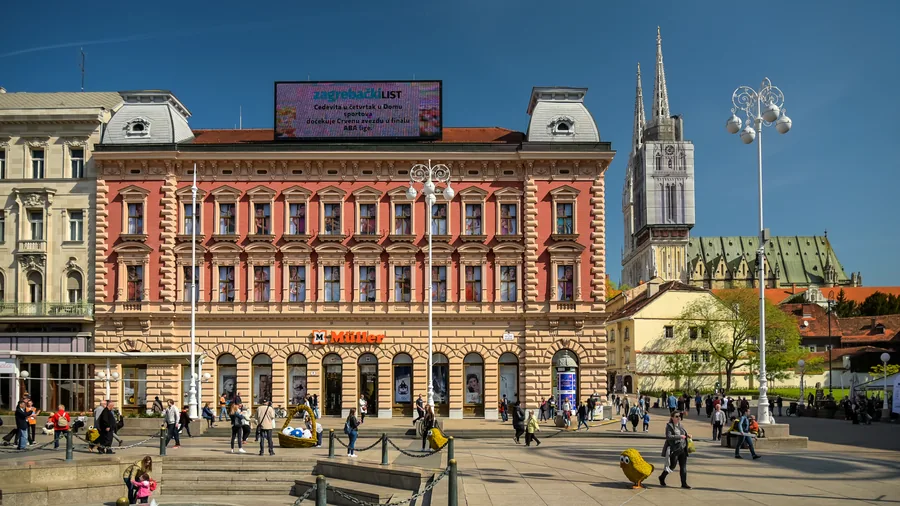 Ban Jelacic Square in Zagreb with the cathedral spires behind the rooftops