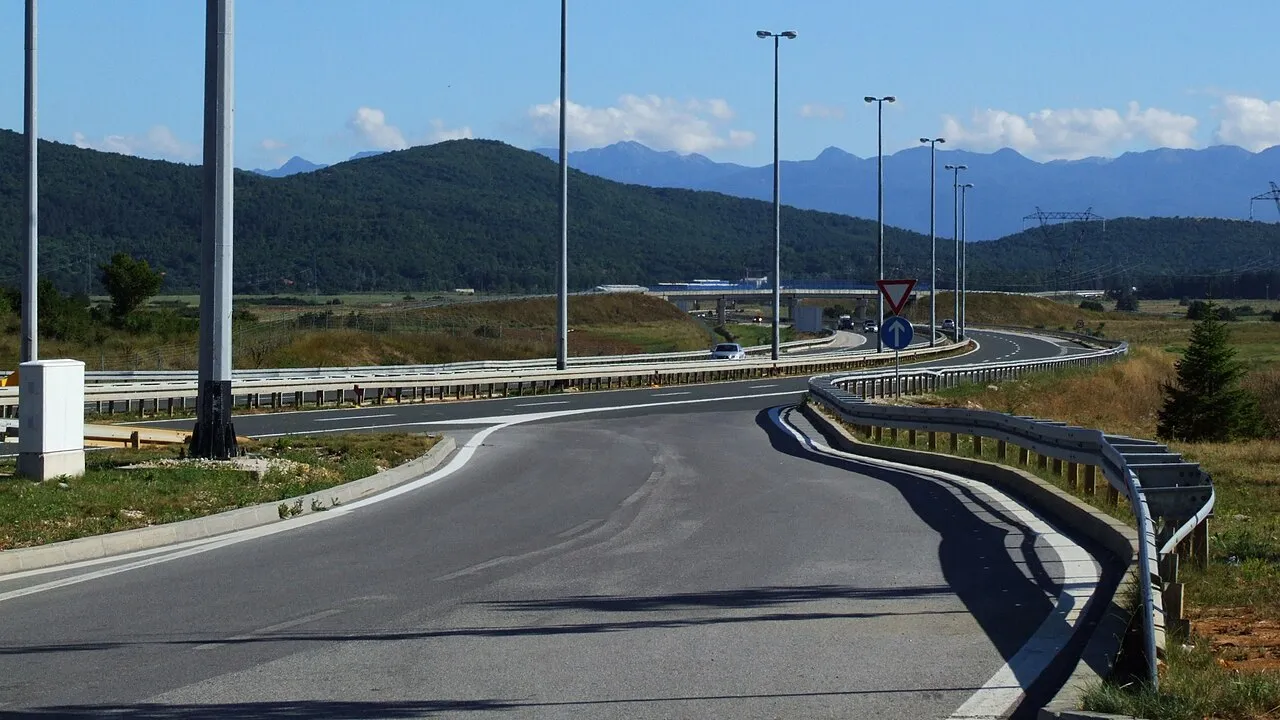 The A1 motorway curving through the karst hills of Lika between Zagreb and Split
