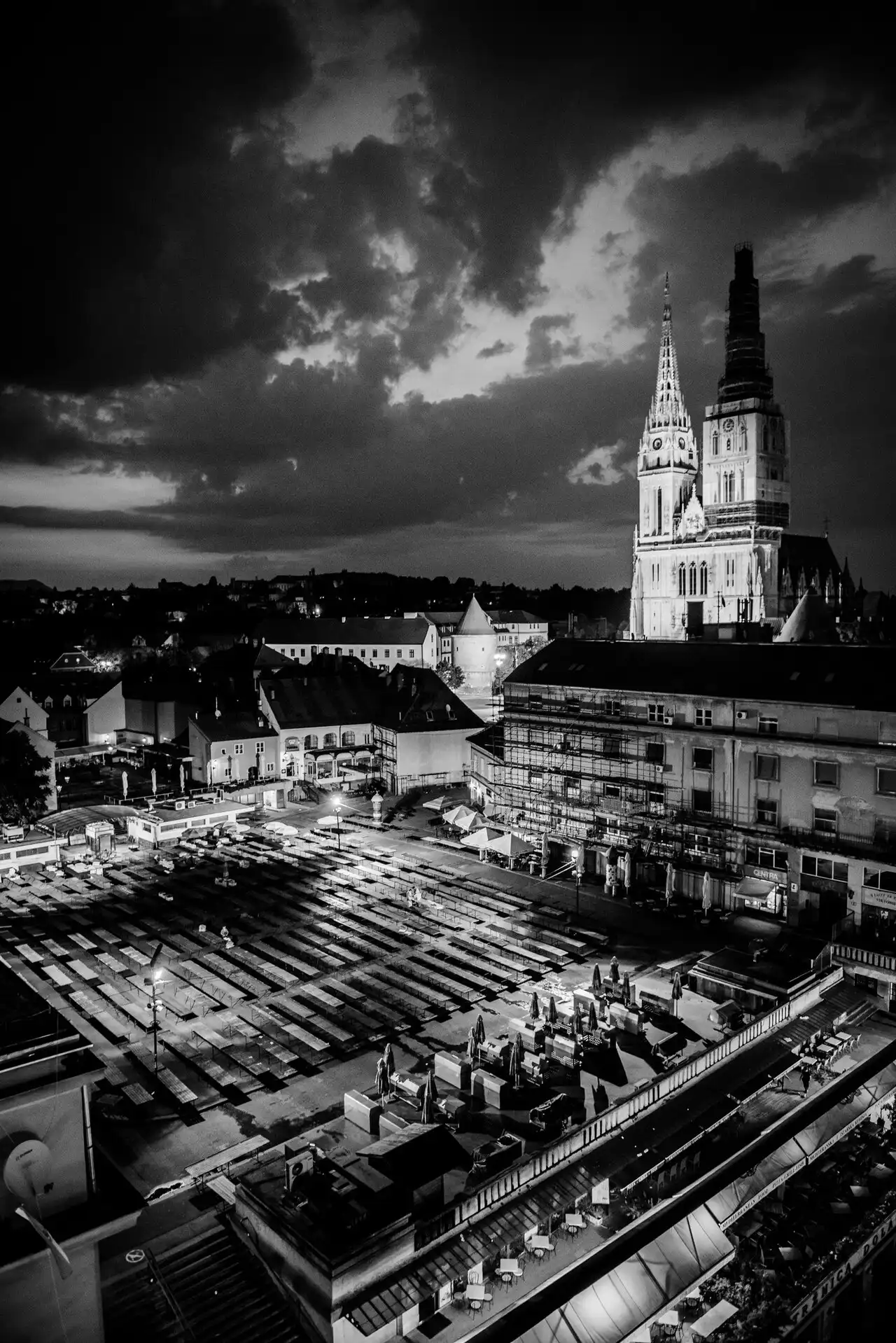 Zagreb Cathedral spires rising above the rooftops by Dolac