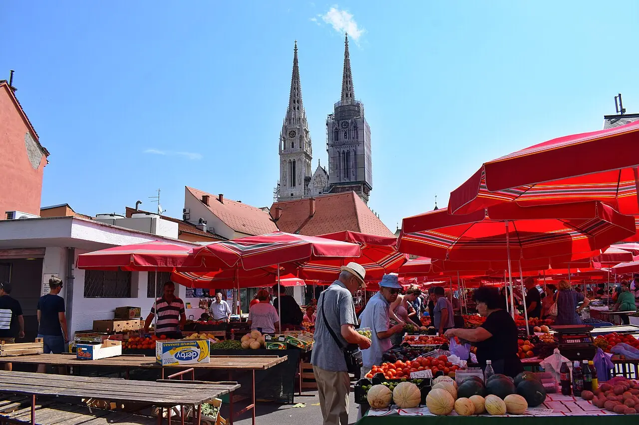 The red parasols of Dolac market with the Cathedral spires behind